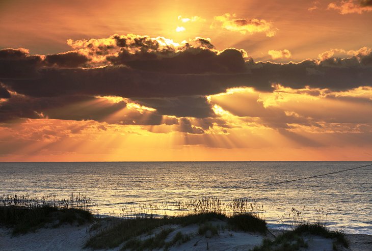 Sun and clouds over the ocean at Frisco