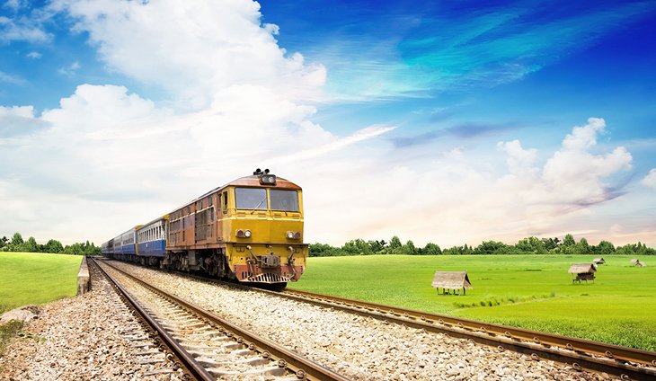 Train traveling through the Thai countryside