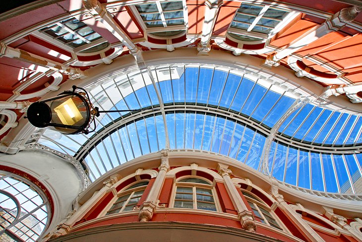 Glass-roofed shopping arcade in Cardiff