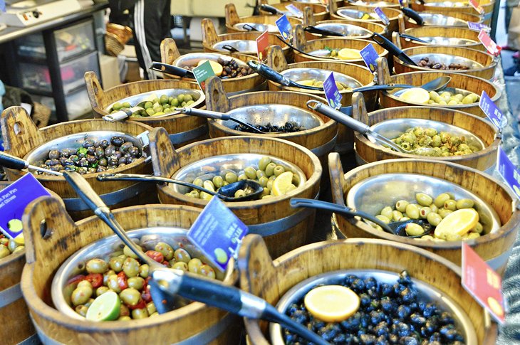 An olive vendor at St. George's Market