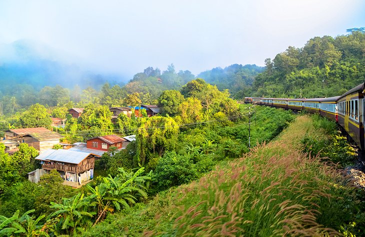A Bangkok to Chiang Mai train traveling through the countryside