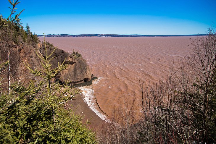 Caves and coastal features at low tide on the Bay of Fundy, near