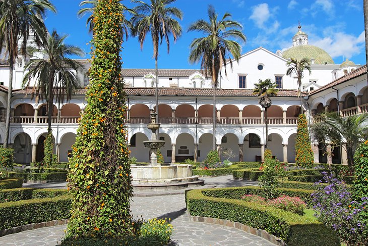 Courtyard gardens, fountain, and dome of the church and monastery of San Francisco
