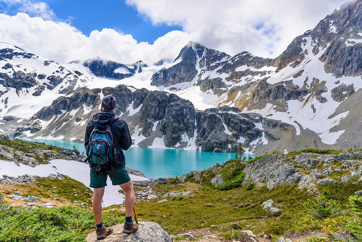 A hiker at Wedgemount Lake