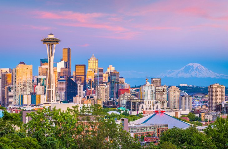 Downtown Seattle at sunset with Mt. Rainier in the distance