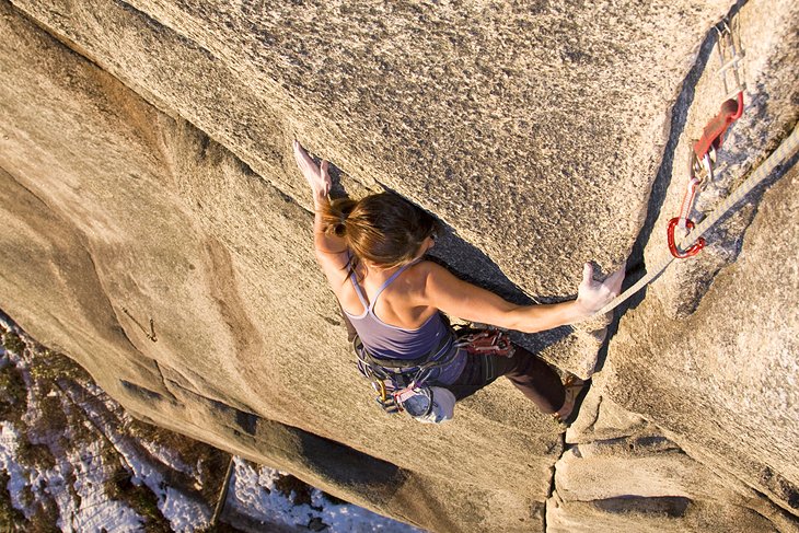 A climber scales a rock face in Squamish