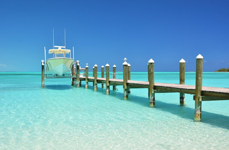 Boat on a wooden jetty in The Exumas