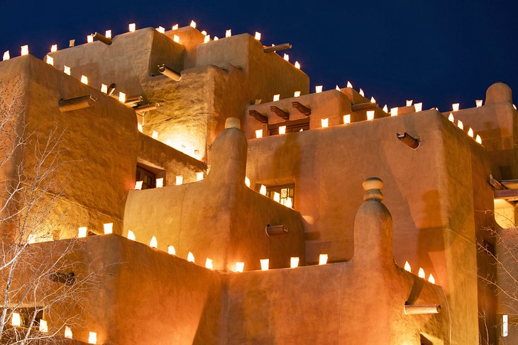 Santa Fe adobe lit by farolitas