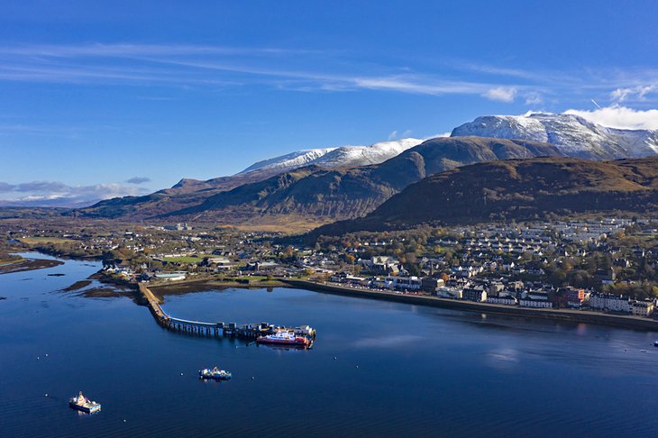 Aerial view of Fort William and snow capped Ben Nevis