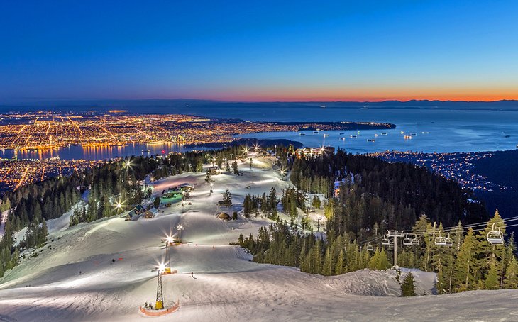 Dusk at Grouse Mountain ski resort overlooking Vancouver