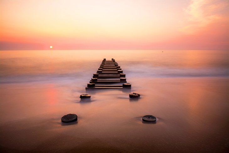 Old pier at Rehoboth Beach in the soft dawn light