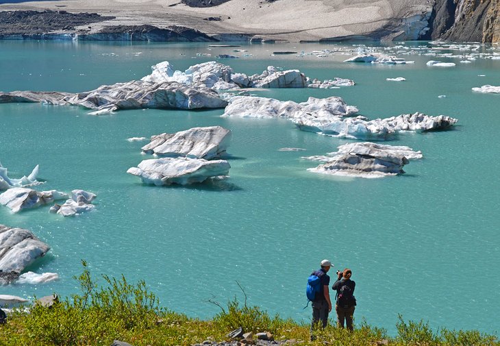 Photographer focusing on Upper Grinnell Lake