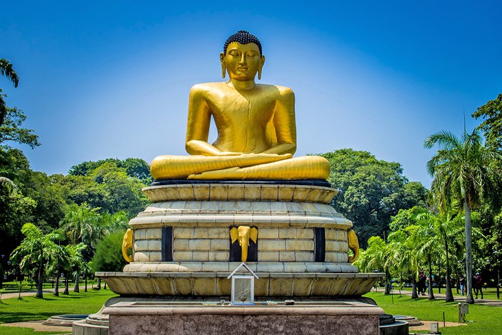 Golden Buddha statue in Viharamahadevi Park