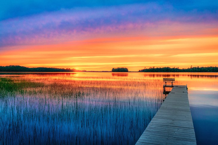 Sunset over a dock in Wisconsin's Northwoods