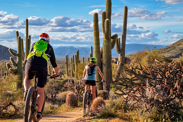 Couple mountain biking in North Scottsdale