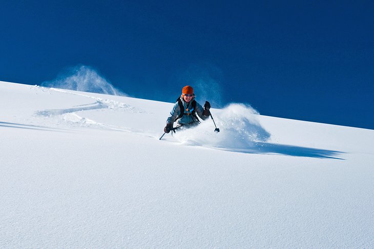 Skier enjoying fresh powder in the Aspen backcountry