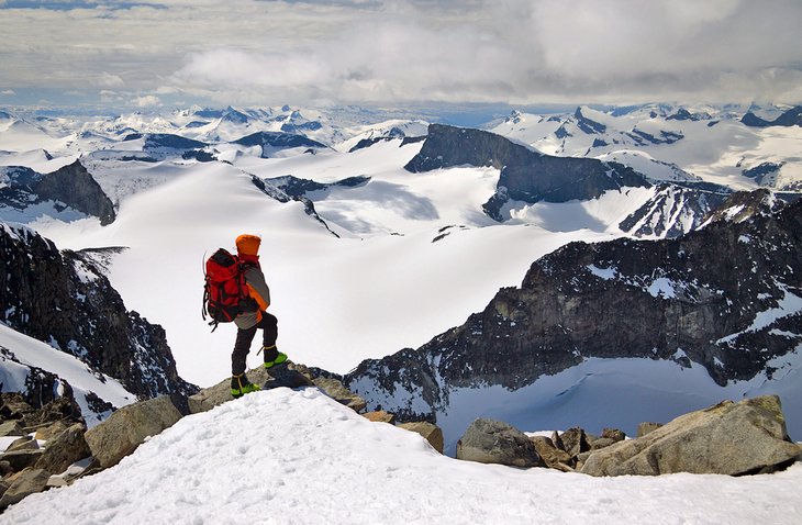 Hiker on the peak of Galdhopiggen