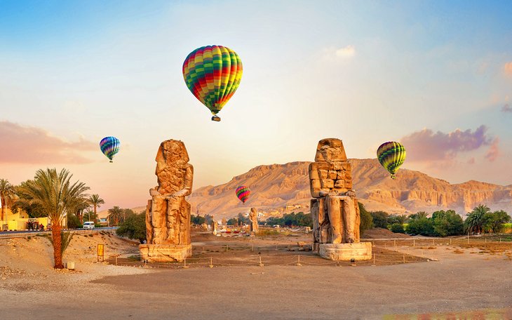 Hot air balloons over the Collosi of Memnon, Luxor