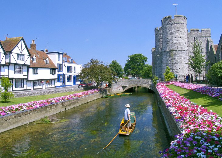 Punt on a moat in front of Westgate Towers, Canterbury