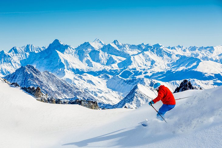 Skier in fresh powder at Vallee Blanche, Chamonix, French Alps