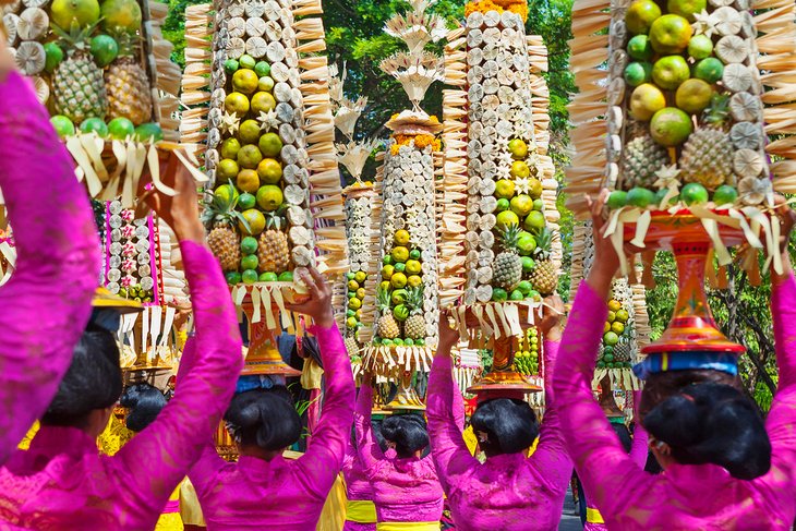 Balinese women in traditional costumes during a Galungan