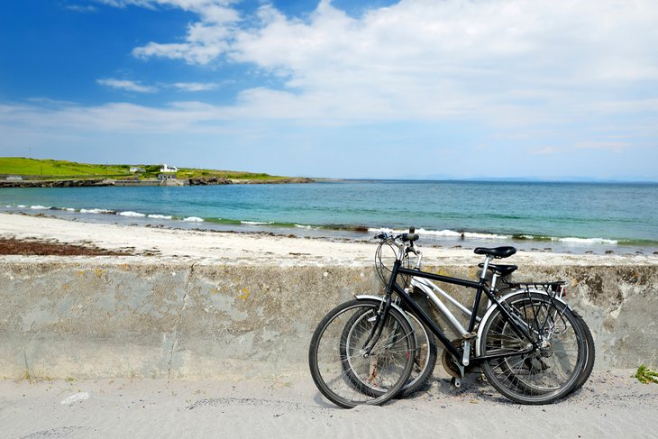 Two bikes near a sandy beach on Inishmore Island, Aran Islands