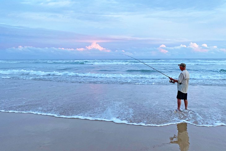 Sunset beach fishing