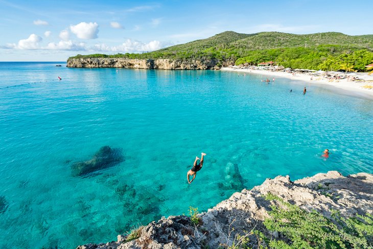 Diving into the clear waters of Curaçao