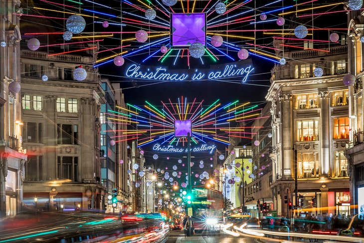 Christmas decorations on bustling Oxford Street, London