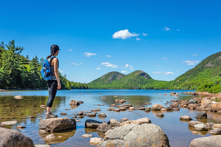 Hiker at Jordan Pond in Acadia National Park, Maine