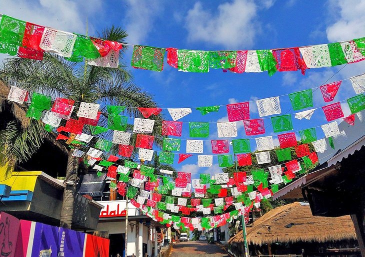 Colorful flags in downtown Playa del Carmen