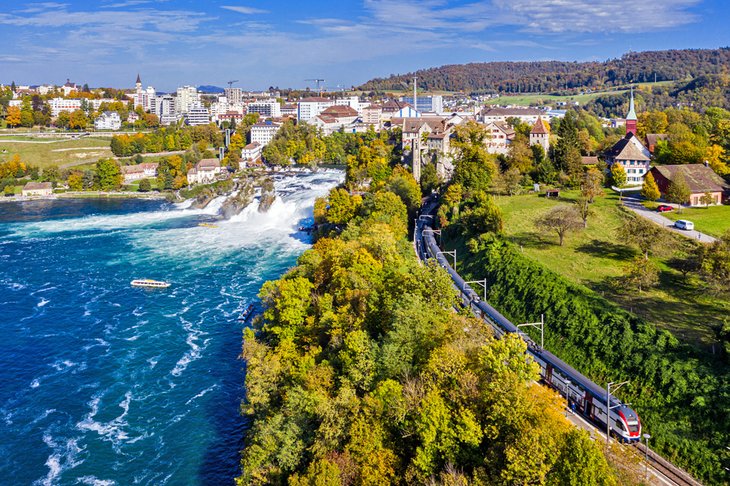 Aerial view of a train by the Rhine Falls