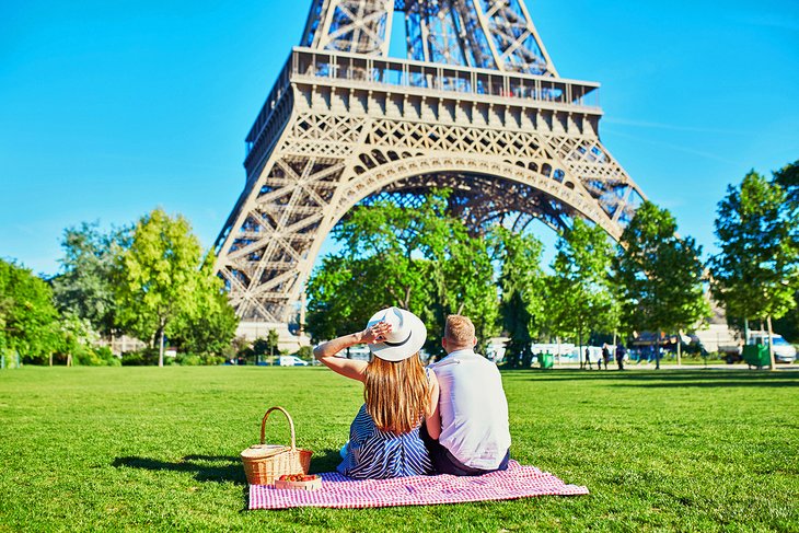 Enjoying a picnic by the Eiffel Tower