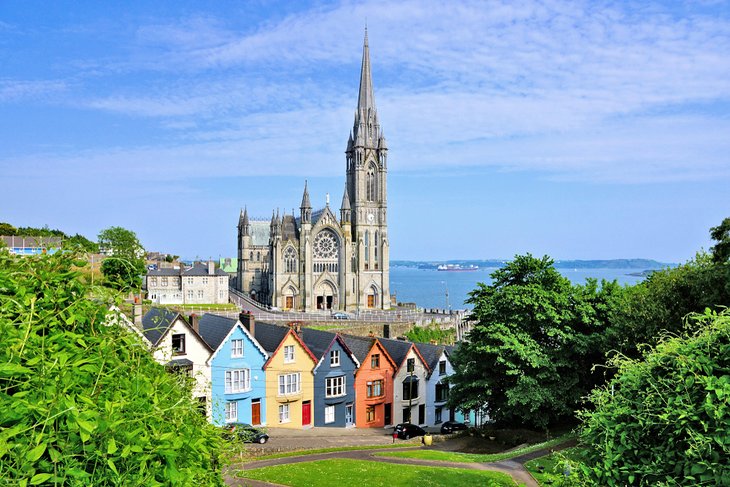 St. Colman's Cathedral and colorful houses in Cobh