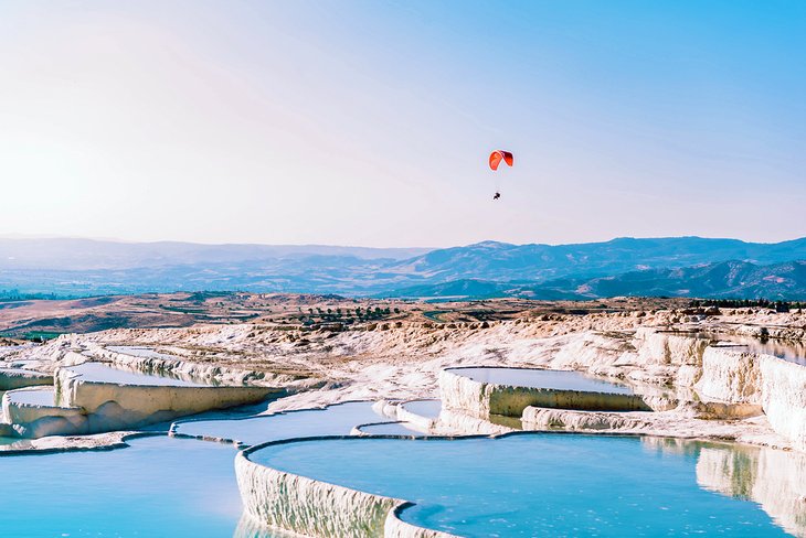 Paragliding over Pamukkale's terraces