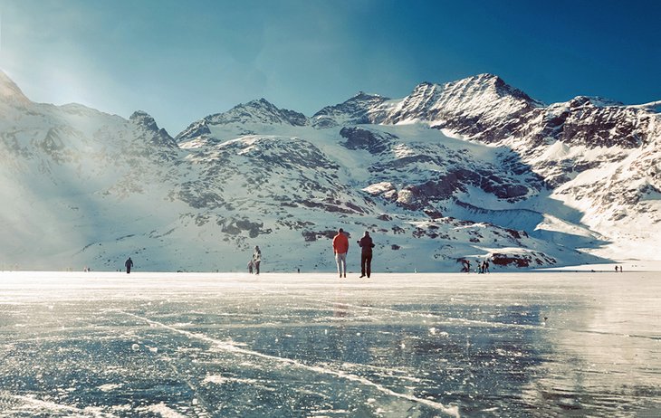 Ice-skaters on Lago Bianco, Switzerland