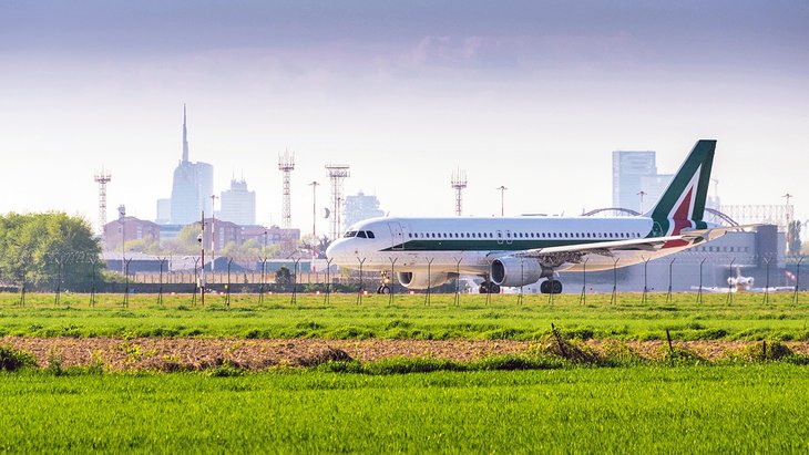Plane landing at the airport in Milan