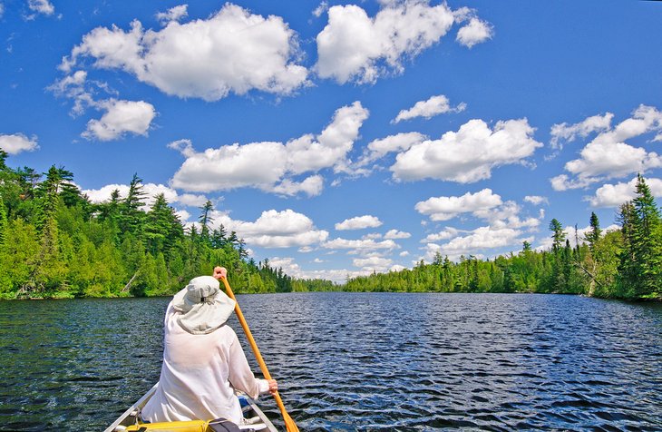 Canoer on Horseshoe Lake in the Boundary Waters near Biwabik