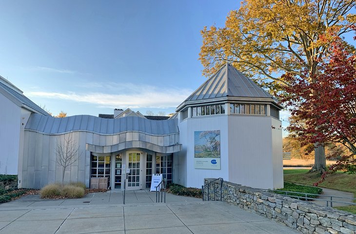 The modern Krieble Gallery stands in stark contrast to the neighboring Georgian Florence Griswold House