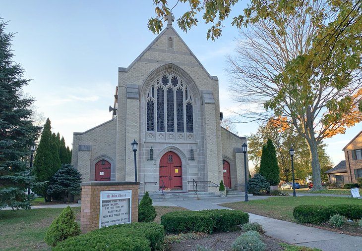 Bright red doors adorn the welcoming entrance to St. John Church.