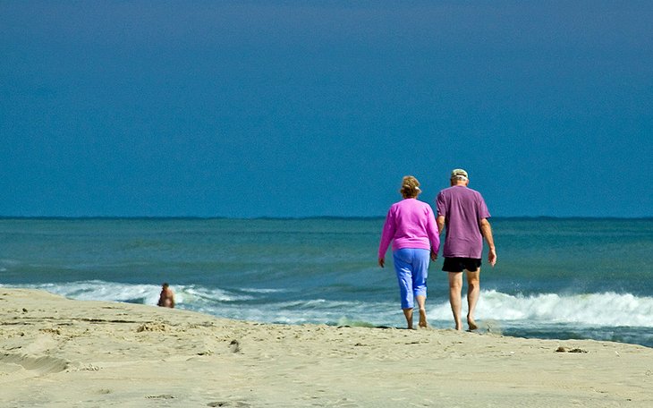 Couple enjoying a walk on Nobadeer Beach