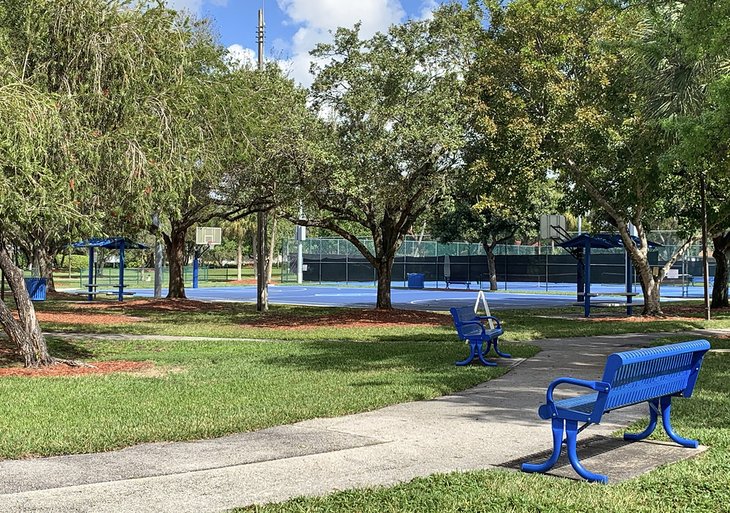 Benches and tennis courts at Winston Park Nature Center