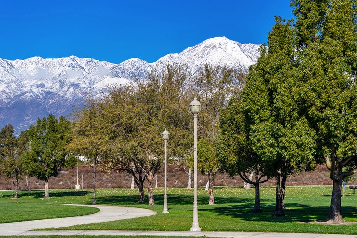 Snowcapped mountains behind Central Park in Rancho Cucamonga