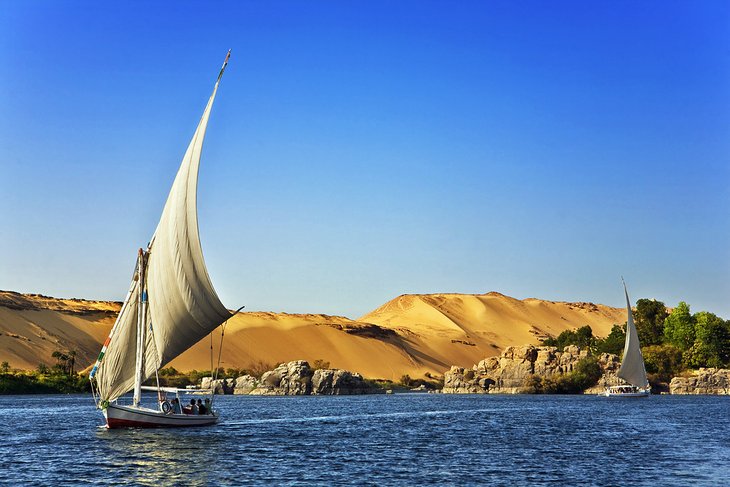 Felucca backed by the desert dunes