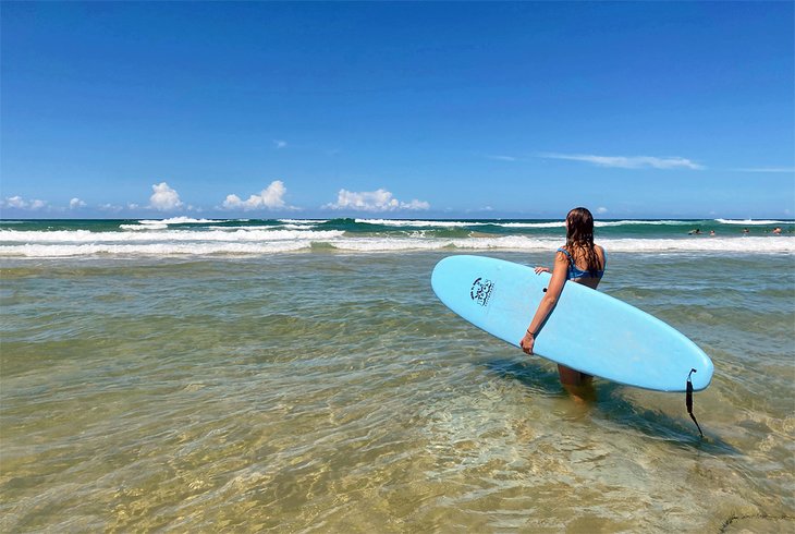 Learning to surf at Coolum Beach