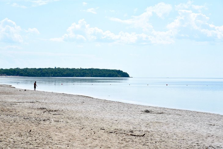 Boy on the shore at Grand Beach, Manitoba