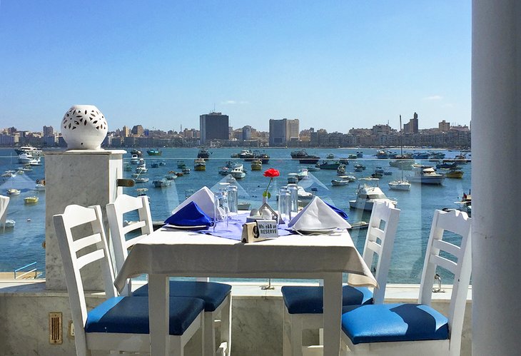 Terrace dining in one of Alex's harbor-front fish restaurants