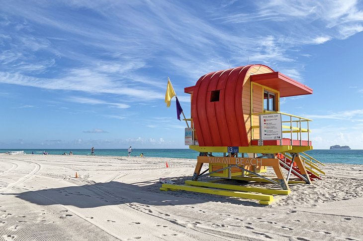 Colorful lifeguard towers brighten the beach at Lummus Park