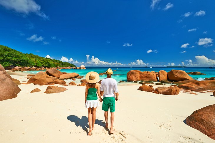 A romantic stroll on a beautiful beach in the Seychelles