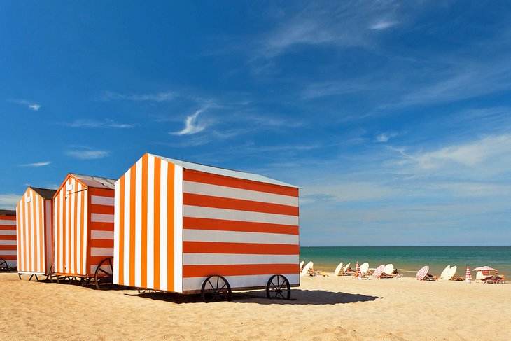 Colorful beach cabanas on De Panne Beach